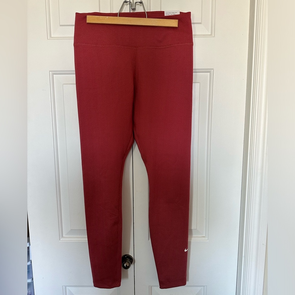 Pink Nike women’s training leggings
